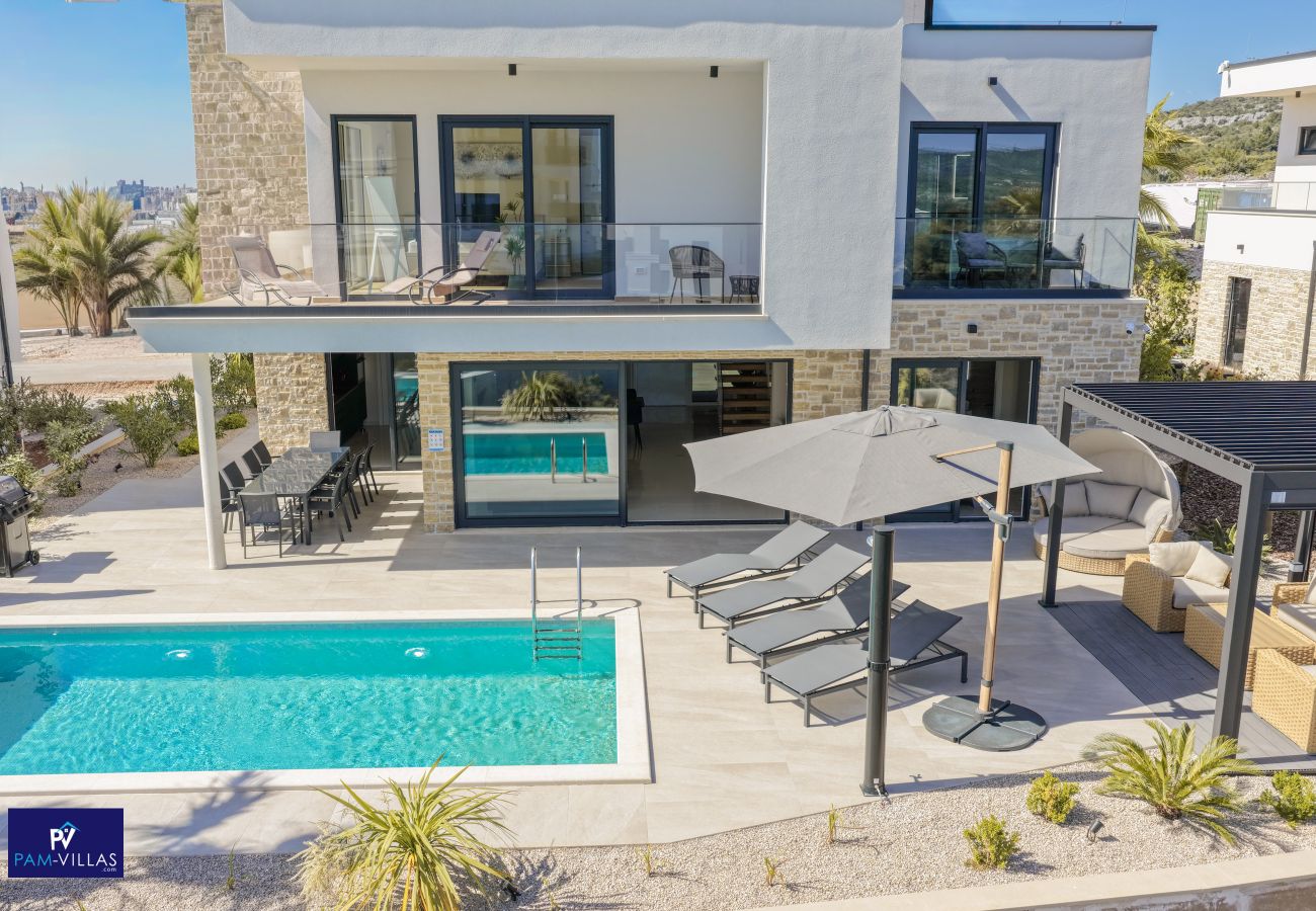 Architecturally modern holiday villa with pool and sunbed