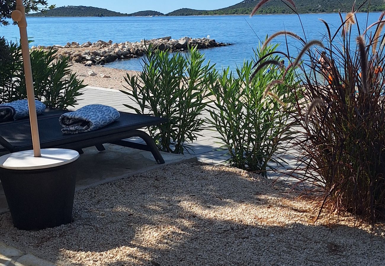 Bungalow/Linked villa in Drage - Buqez Eco Resort - Villa 26 - 1st row to sea