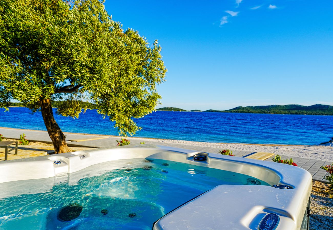 Villa in Drage - BUQEZ ECO RESORT - Villa 28 - Direkt am Strand