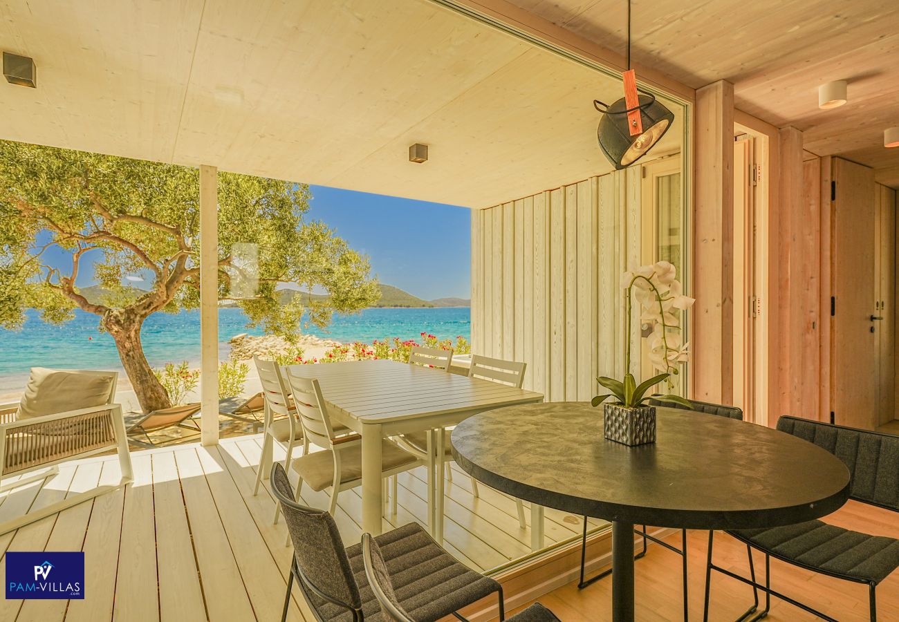 Ferienhaus in Drage - BUQEZ ECO RESORT - Villa 28 - Direkt am Strand