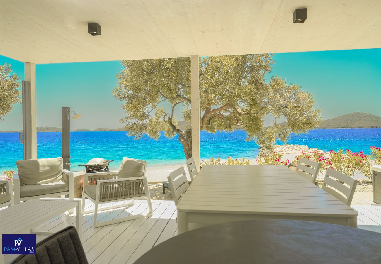 Ferienhaus in Drage - BUQEZ ECO RESORT - Villa 28 - Direkt am Strand