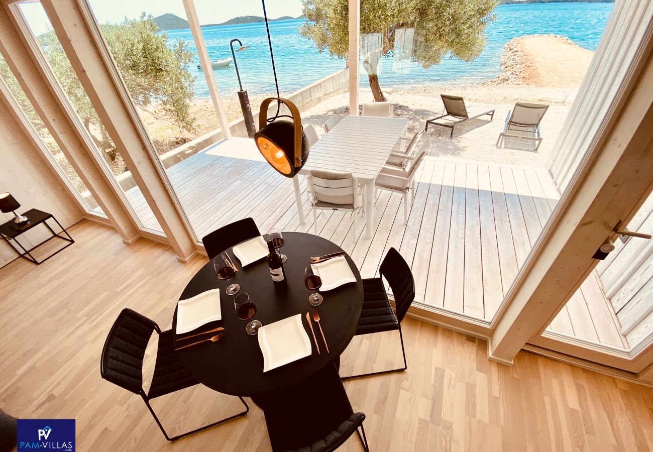 Ferienhaus in Drage - BUQEZ ECO RESORT - Villa 28 - Direkt am Strand