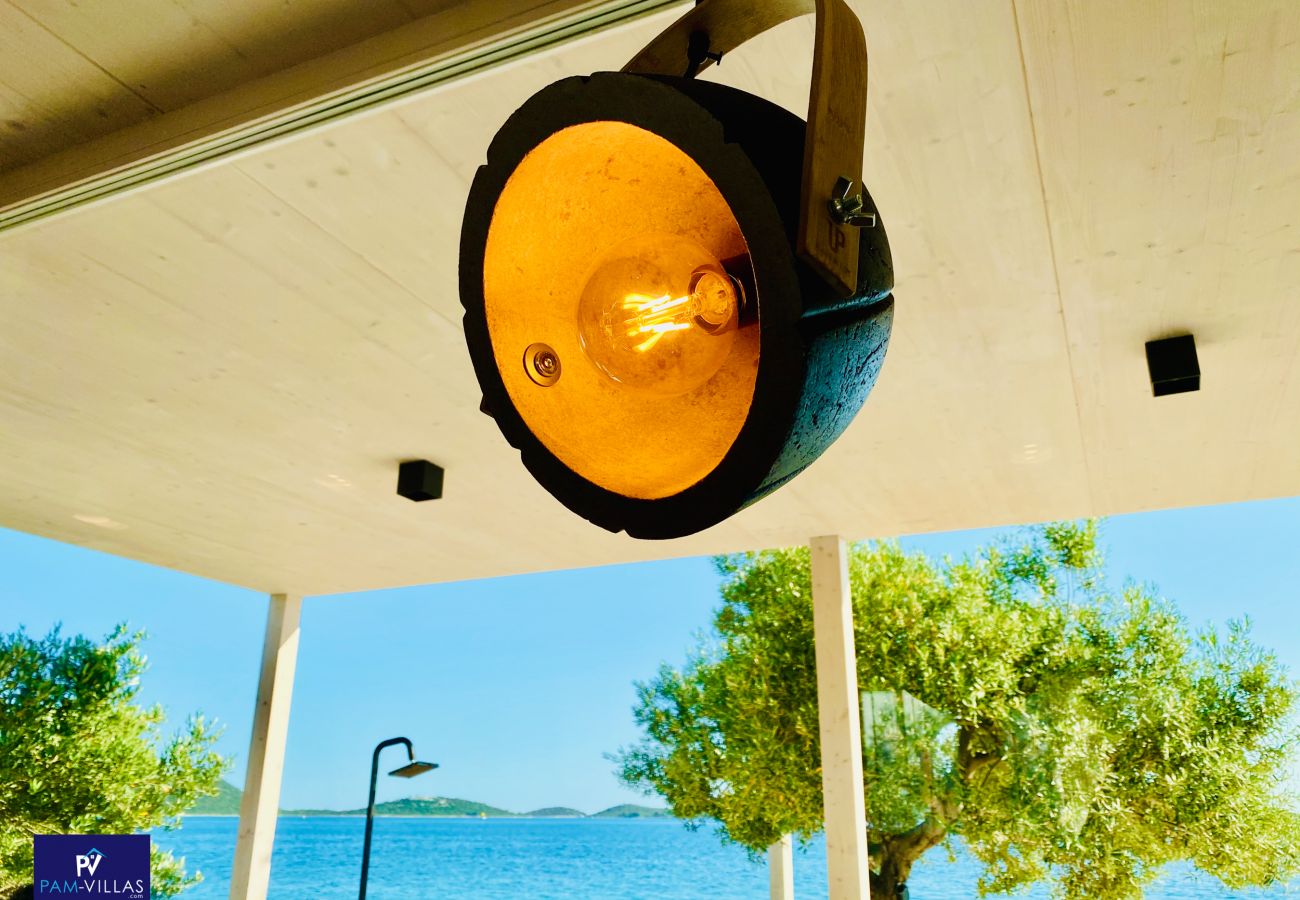 Ferienhaus in Drage - BUQEZ ECO RESORT - Villa 28 - Direkt am Strand
