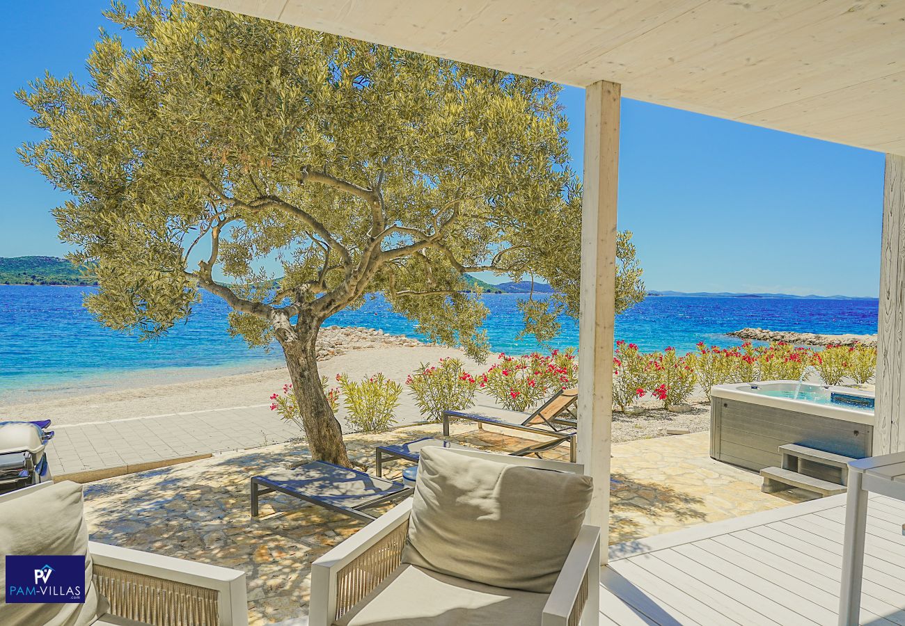 Ferienhaus in Drage - BUQEZ ECO RESORT - Villa 28 - Direkt am Strand