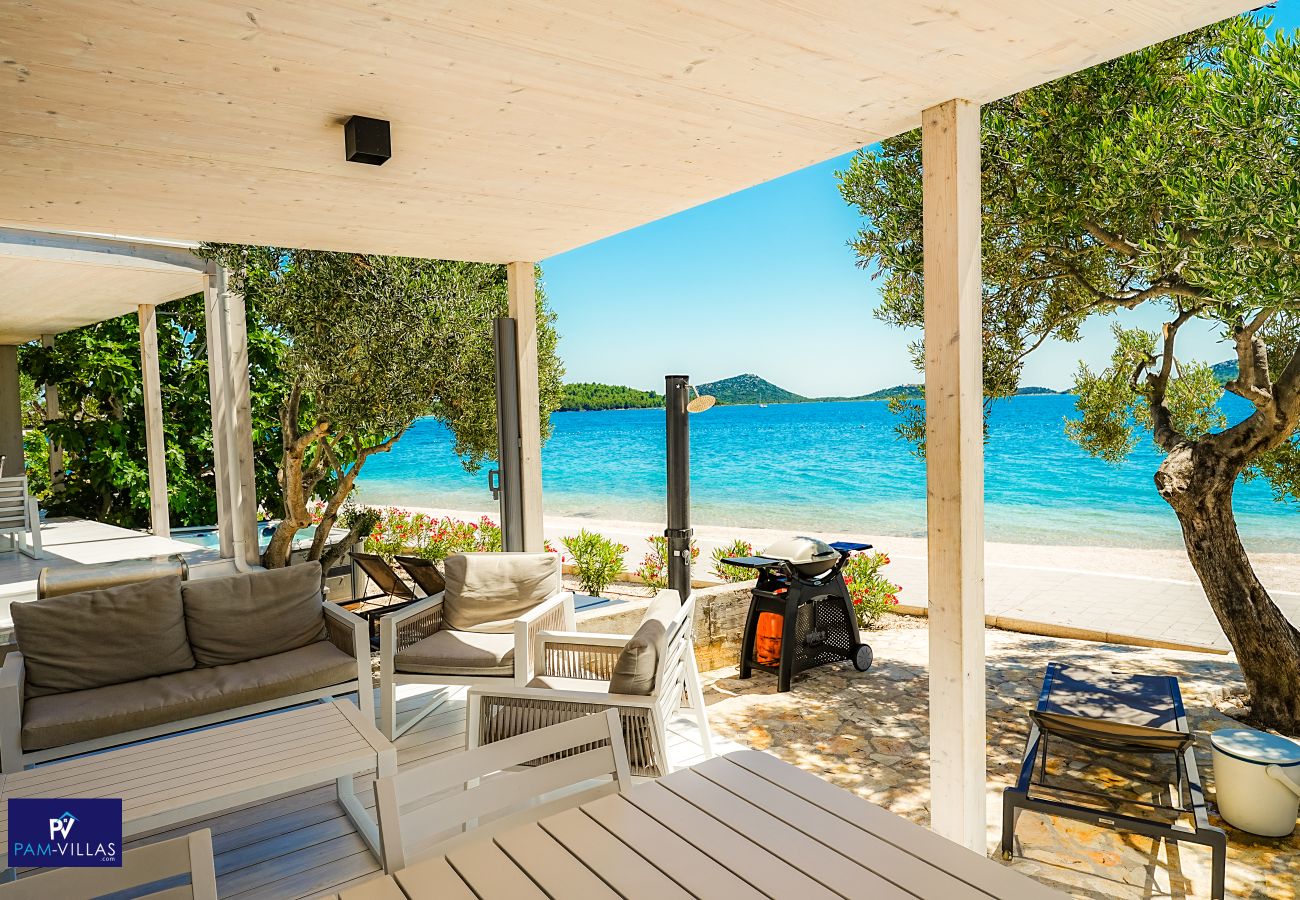 Ferienhaus in Drage - BUQEZ ECO RESORT - Villa 28 - Direkt am Strand