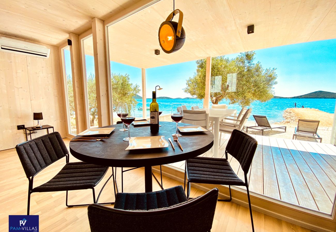 Ferienhaus in Drage - BUQEZ ECO RESORT - Villa 28 - Direkt am Strand