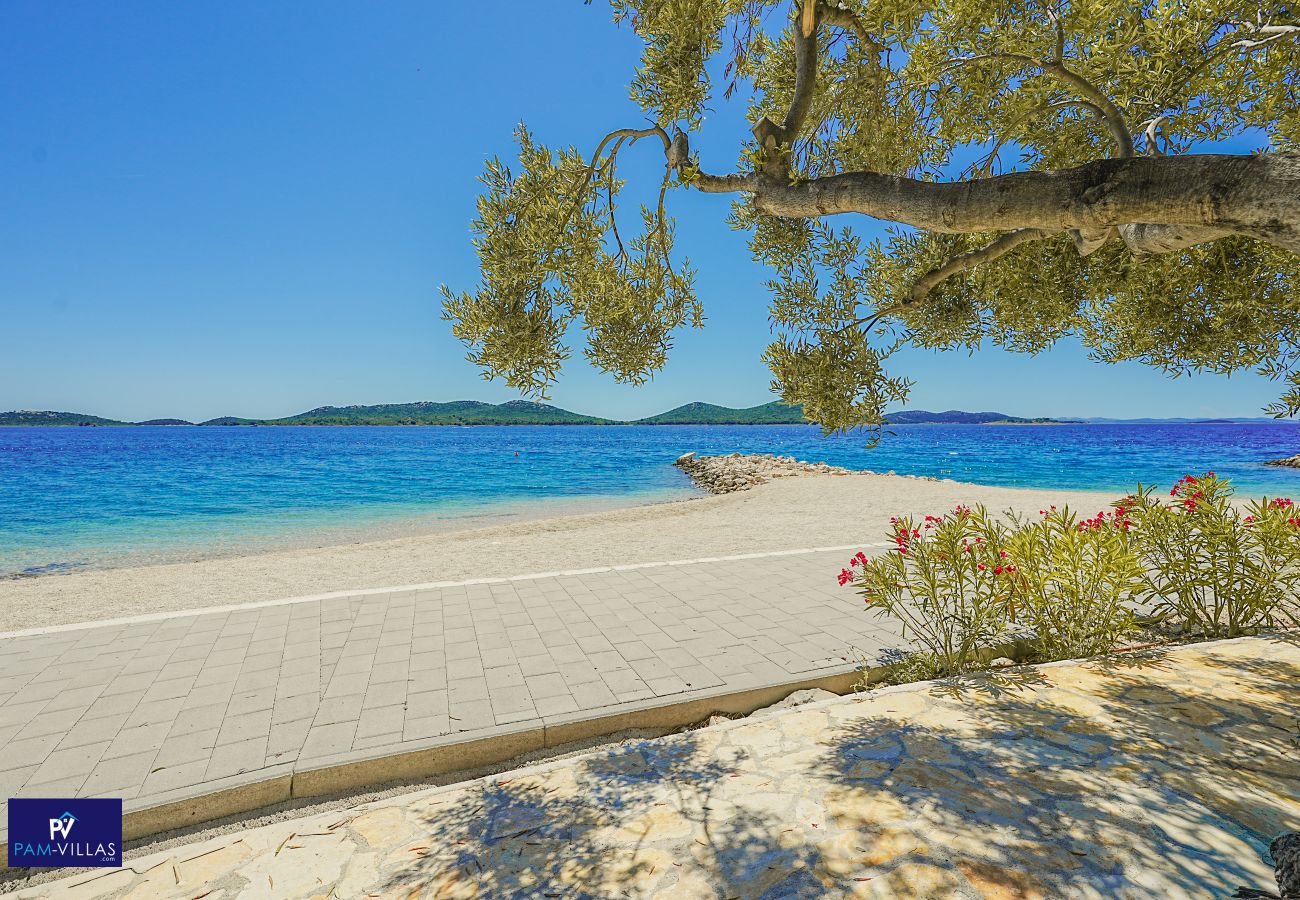 Ferienhaus in Drage - BUQEZ ECO RESORT - Villa 28 - Direkt am Strand