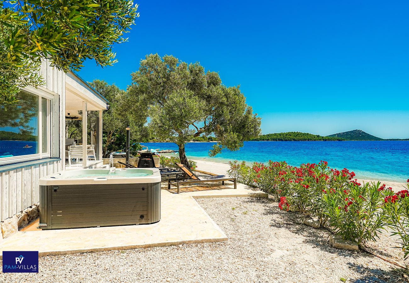 Ferienhaus in Drage - BUQEZ ECO RESORT - Villa 28 - Direkt am Strand