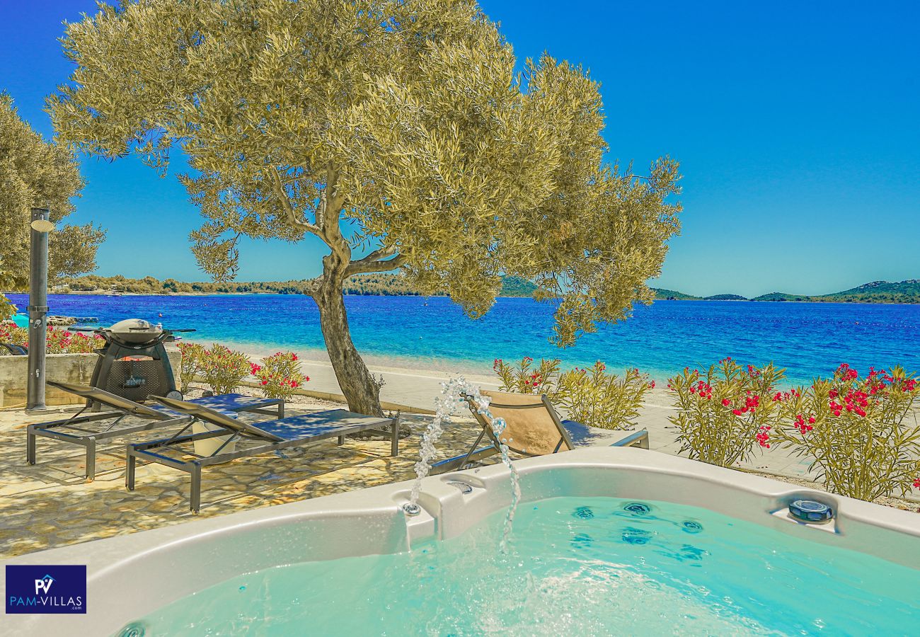 Ferienhaus in Drage - BUQEZ ECO RESORT - Villa 28 - Direkt am Strand