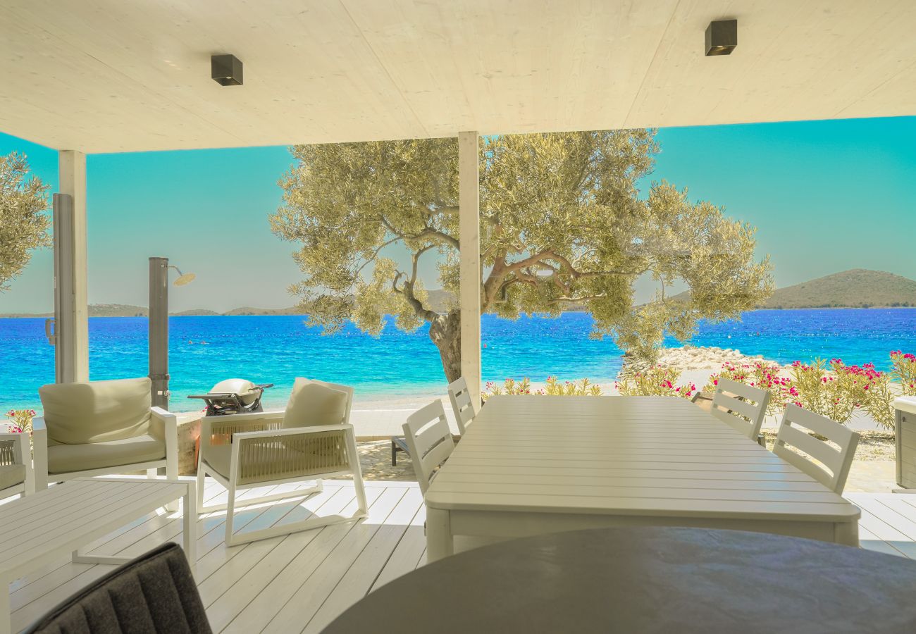 Ferienhaus in Drage - BUQEZ ECO RESORT - Villa 28 - Direkt am Strand