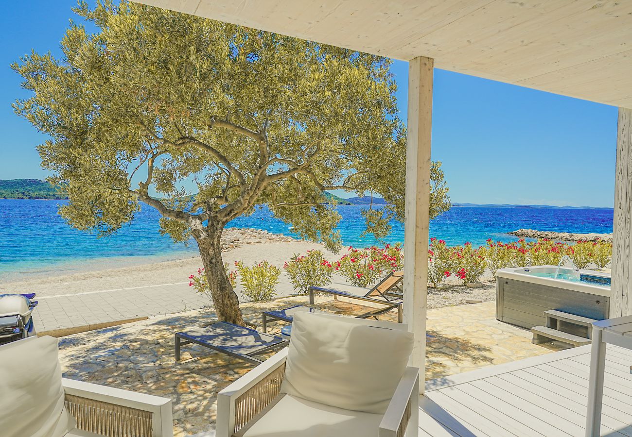 Ferienhaus in Drage - BUQEZ ECO RESORT - Villa 28 - Direkt am Strand