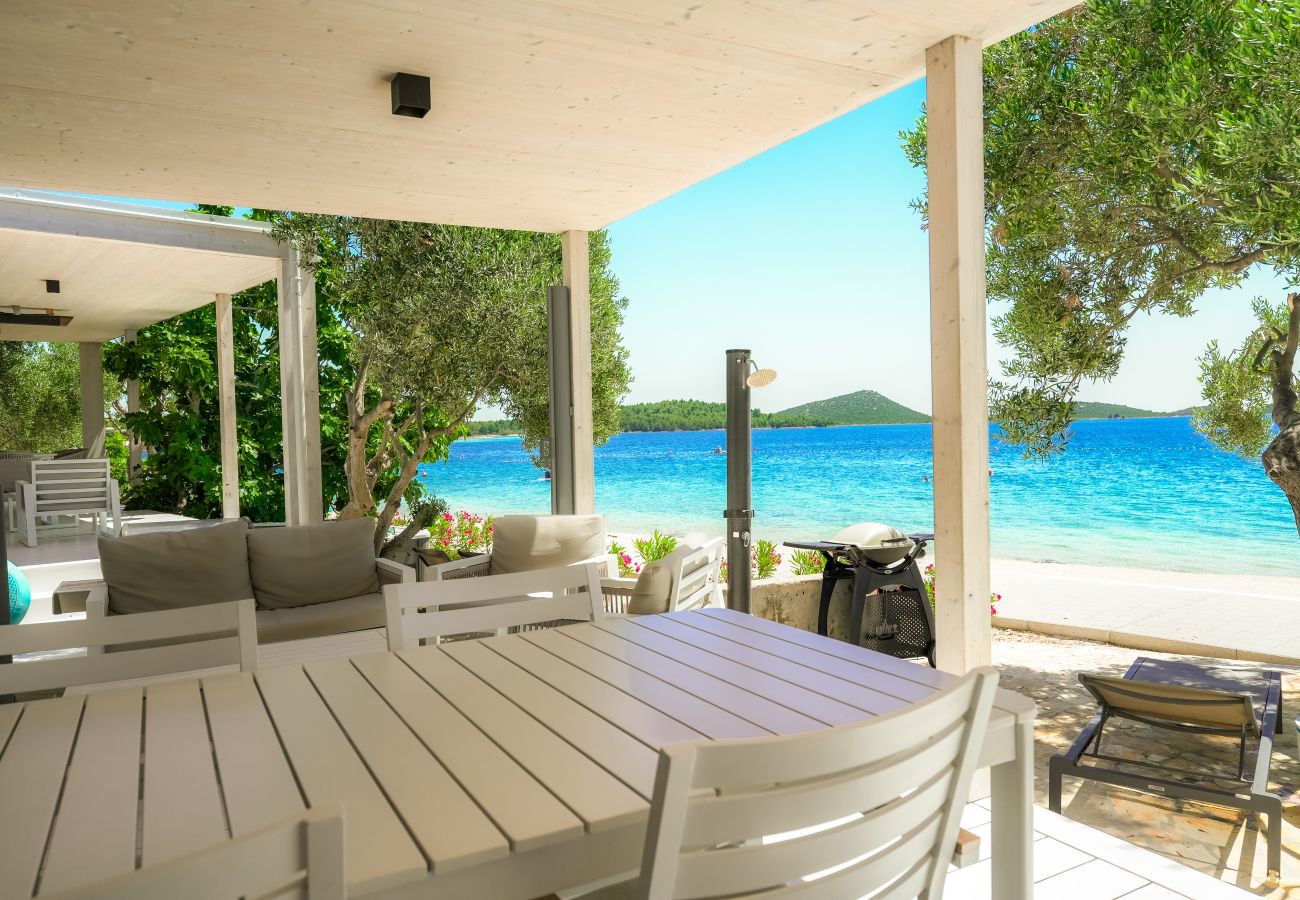 Ferienhaus in Drage - BUQEZ ECO RESORT - Villa 28 - Direkt am Strand