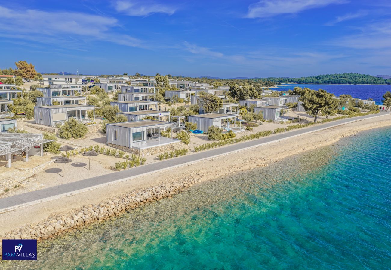 Ferienhaus in Drage - BUQEZ ECO RESORT - Villa 81 - Direkt am Strand