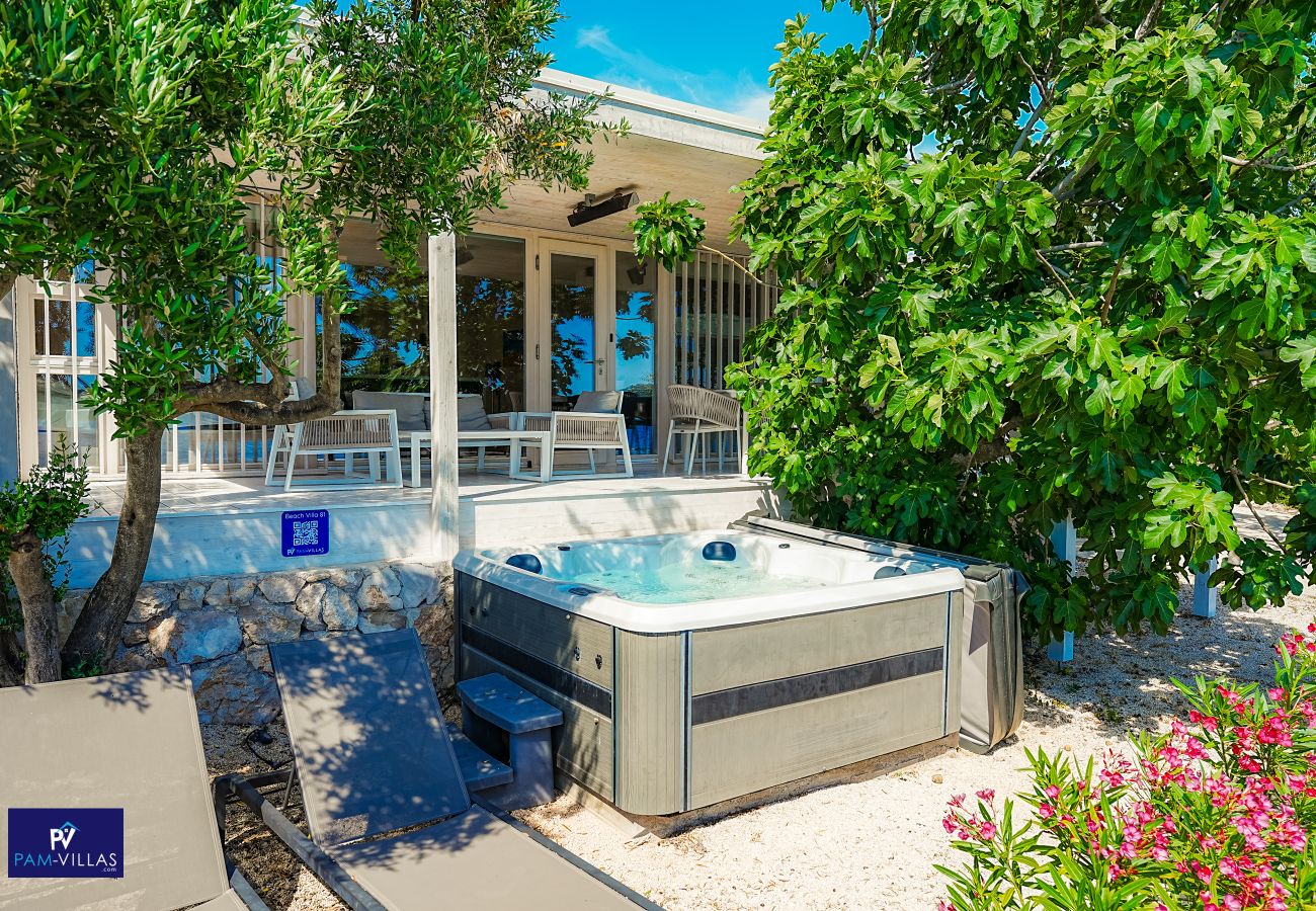 Ferienhaus in Drage - BUQEZ ECO RESORT - Villa 81 - Direkt am Strand