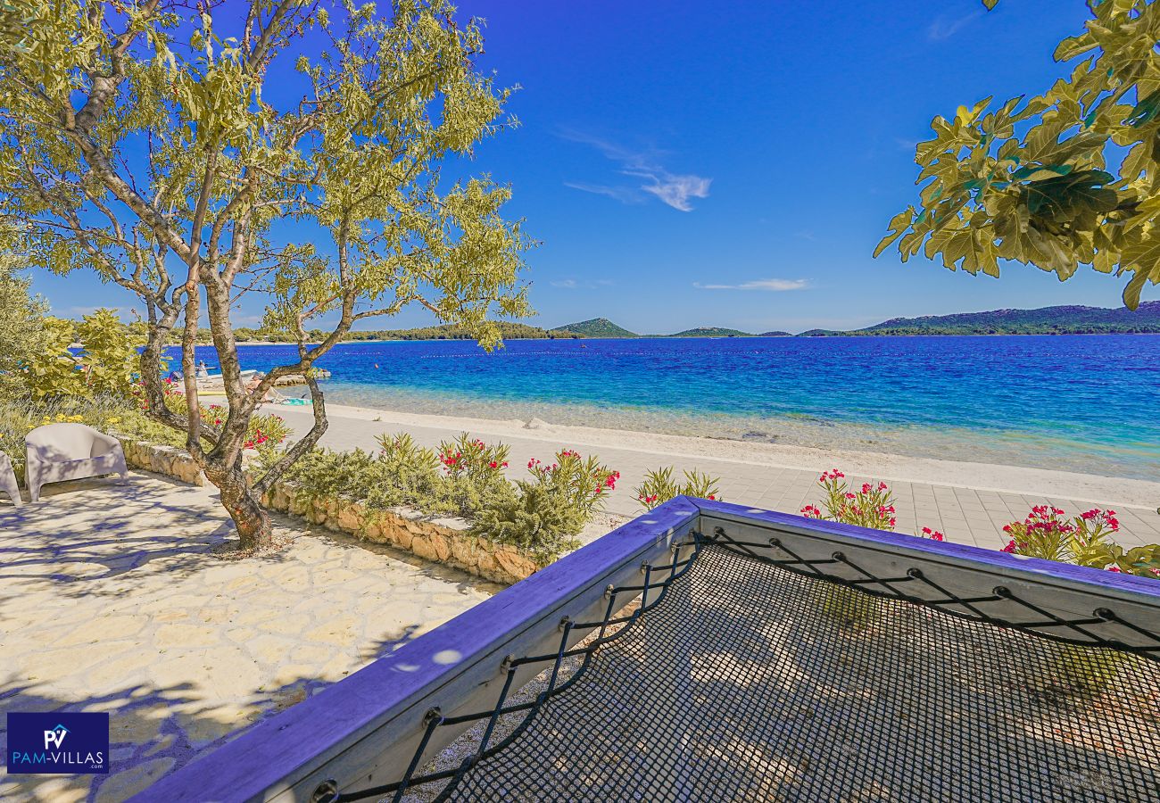 Ferienhaus in Drage - BUQEZ ECO RESORT - Villa 81 - Direkt am Strand