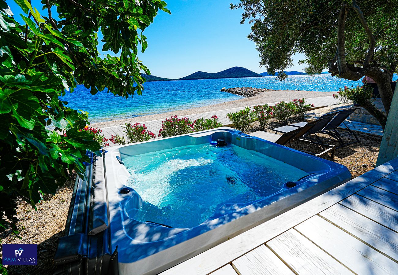 Ferienhaus in Drage - BUQEZ ECO RESORT - Villa 81 - Direkt am Strand