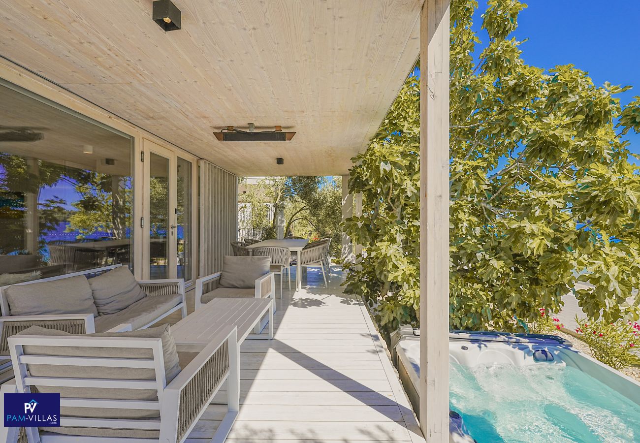 Ferienhaus in Drage - BUQEZ ECO RESORT - Villa 81 - Direkt am Strand