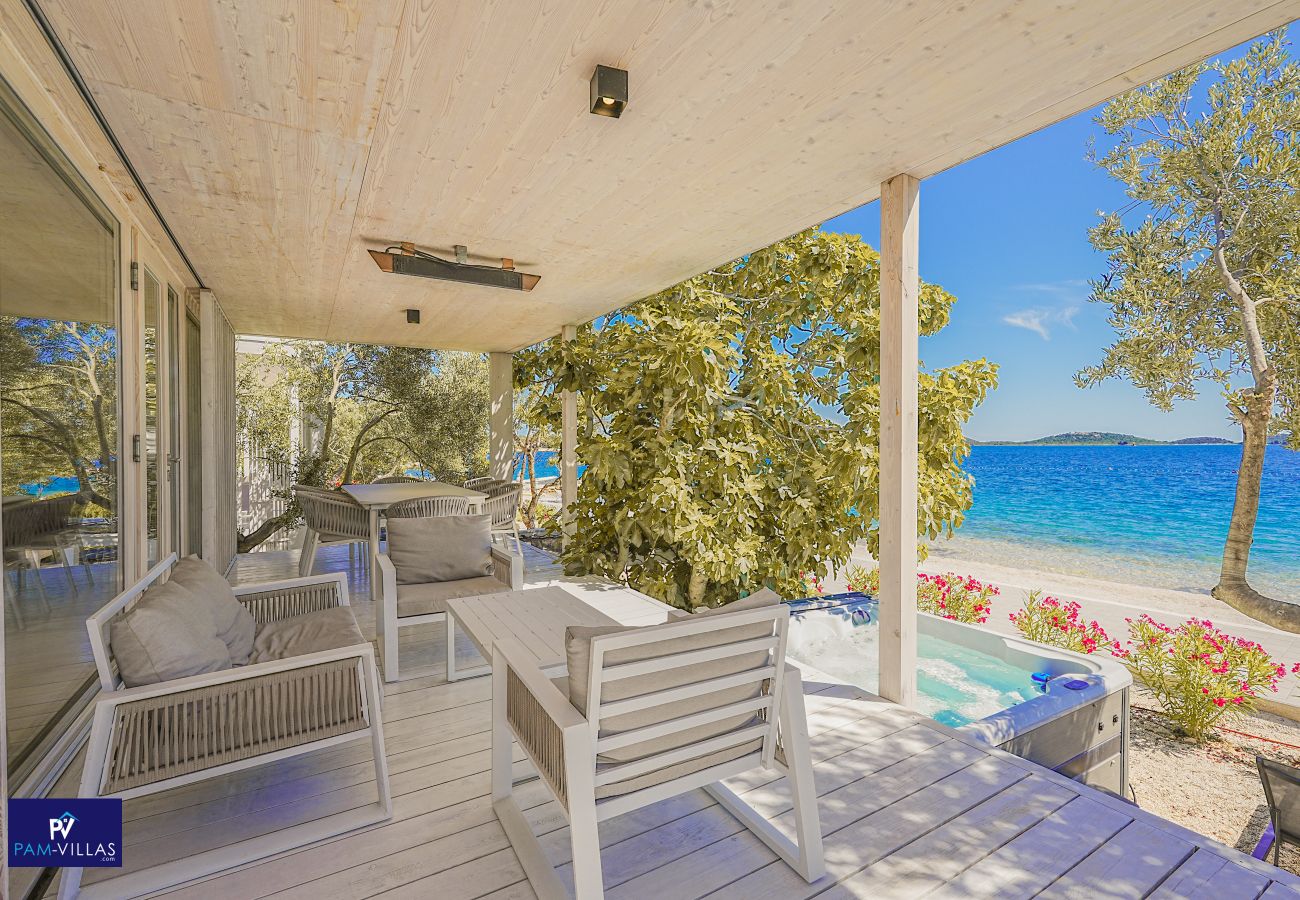 Ferienhaus in Drage - BUQEZ ECO RESORT - Villa 81 - Direkt am Strand