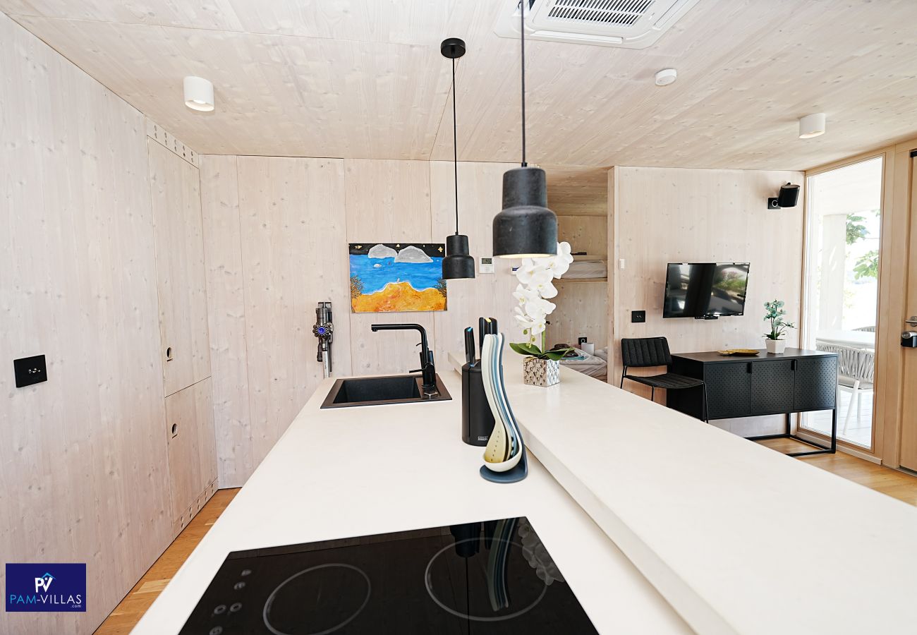 Ferienhaus in Drage - BUQEZ ECO RESORT - Villa 81 - Direkt am Strand