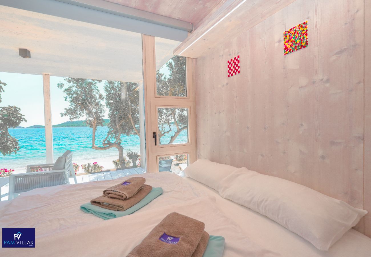 Ferienhaus in Drage - BUQEZ ECO RESORT - Villa 81 - Direkt am Strand