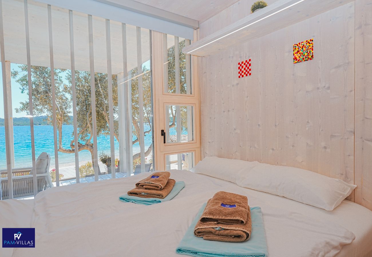 Ferienhaus in Drage - BUQEZ ECO RESORT - Villa 81 - Direkt am Strand