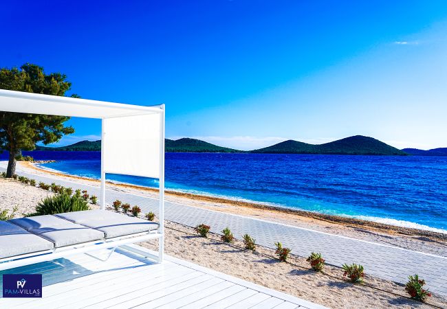 Ferienhaus in Drage - BUQEZ ECO RESORT - Villa 22 - Direkt am Strand