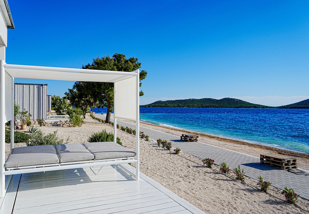 Villa in Drage - BUQEZ ECO RESORT - Villa 22 - Direkt am Strand