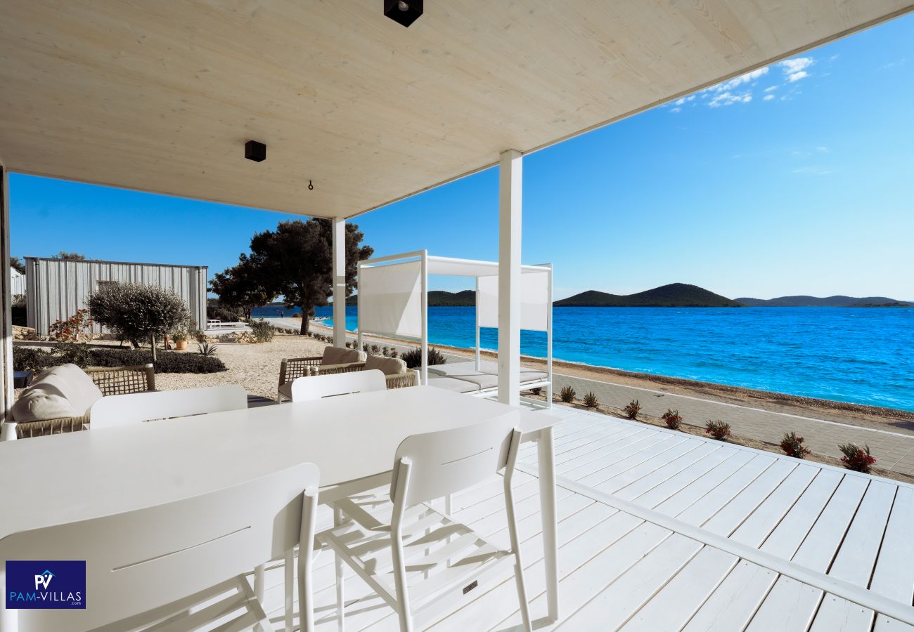 Ferienhaus in Drage - BUQEZ ECO RESORT - Villa 22 - Direkt am Strand