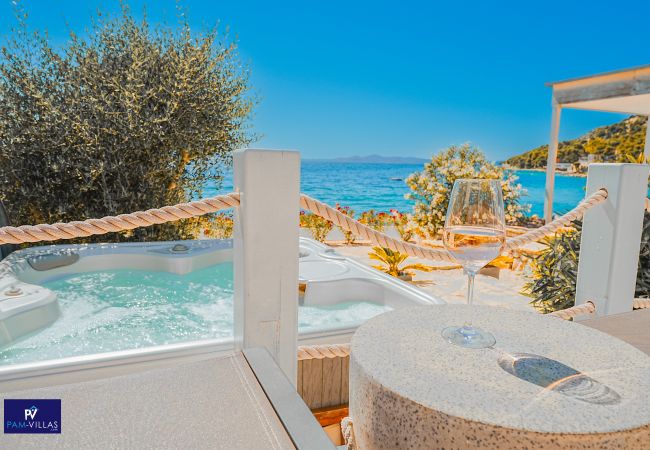 Ferienhaus in Drage - BUQEZ ECO RESORT - Villa 18 - Direkt am Strand