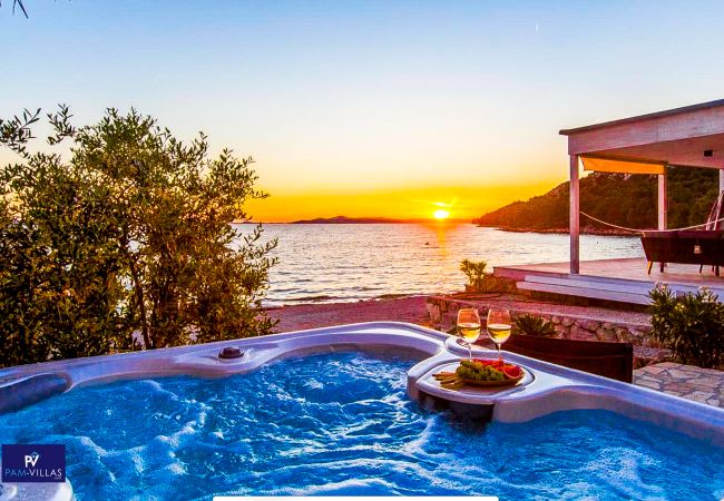Ferienhaus in Drage - BUQEZ ECO RESORT - Villa 18 - Direkt am Strand