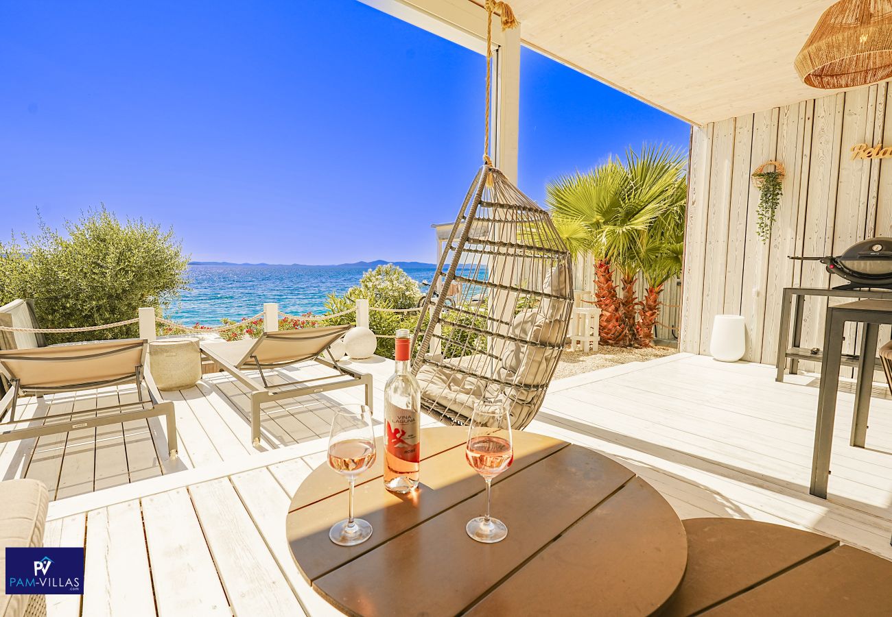 Ferienhaus in Drage - BUQEZ ECO RESORT - Villa 18 - Direkt am Strand