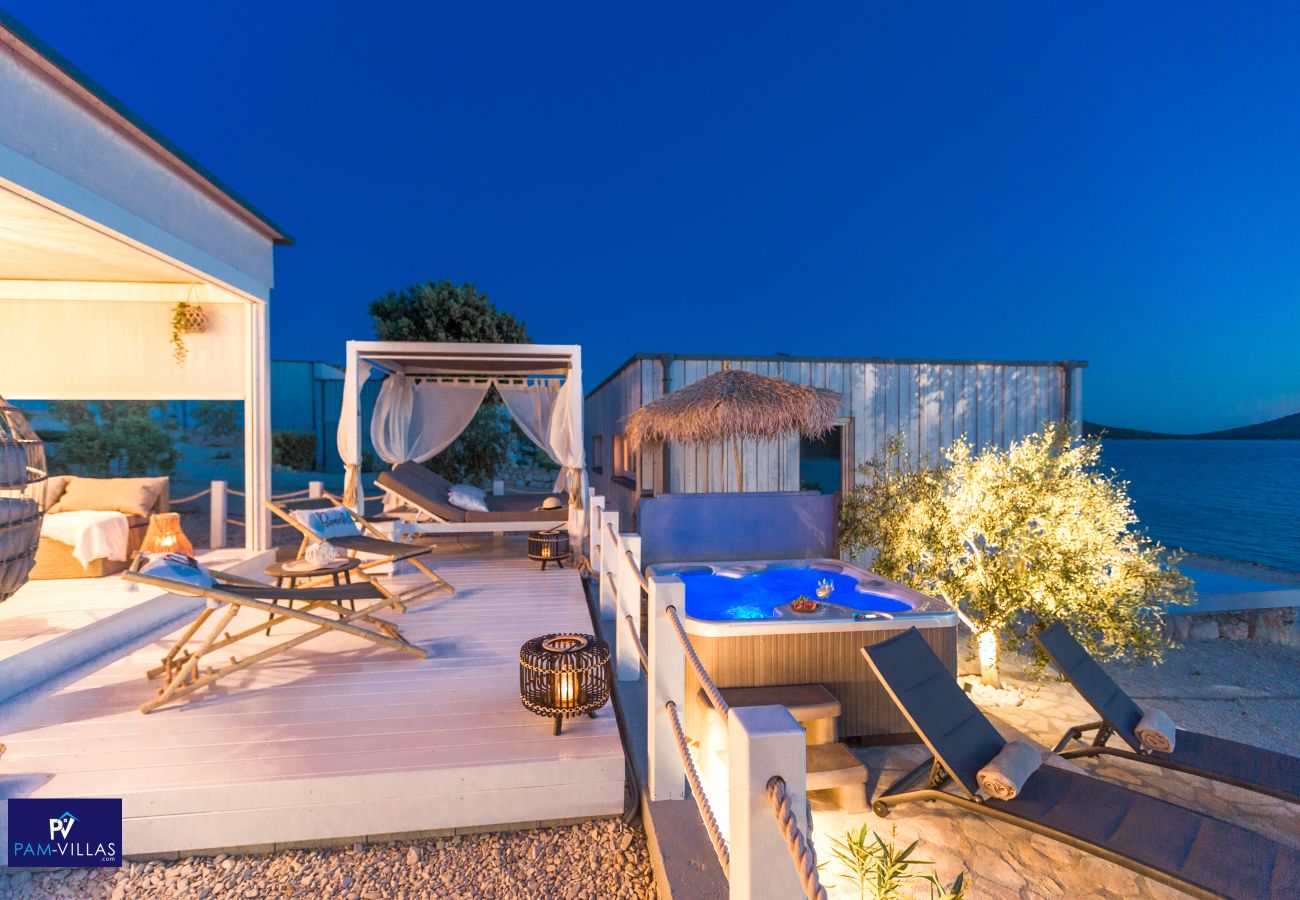 Ferienhaus in Drage - BUQEZ ECO RESORT - Villa 18 - Direkt am Strand