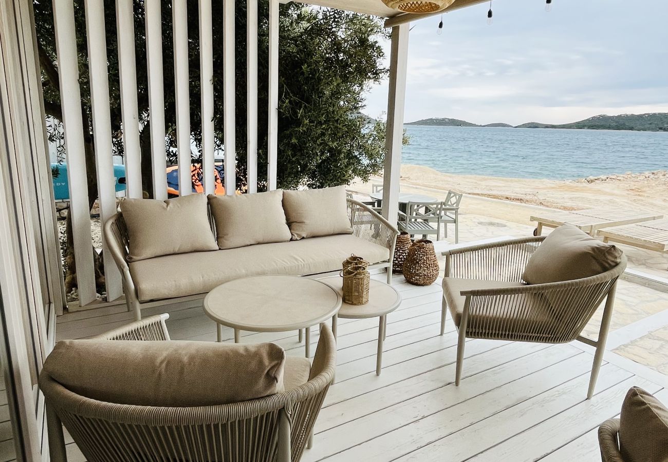 Villa in Drage - BUQEZ ECO RESORT - Villa 27 - Direkt am Strand