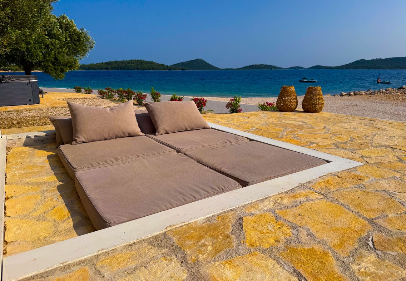 Villa in Drage - BUQEZ ECO RESORT - Villa 27 - Direkt am Strand