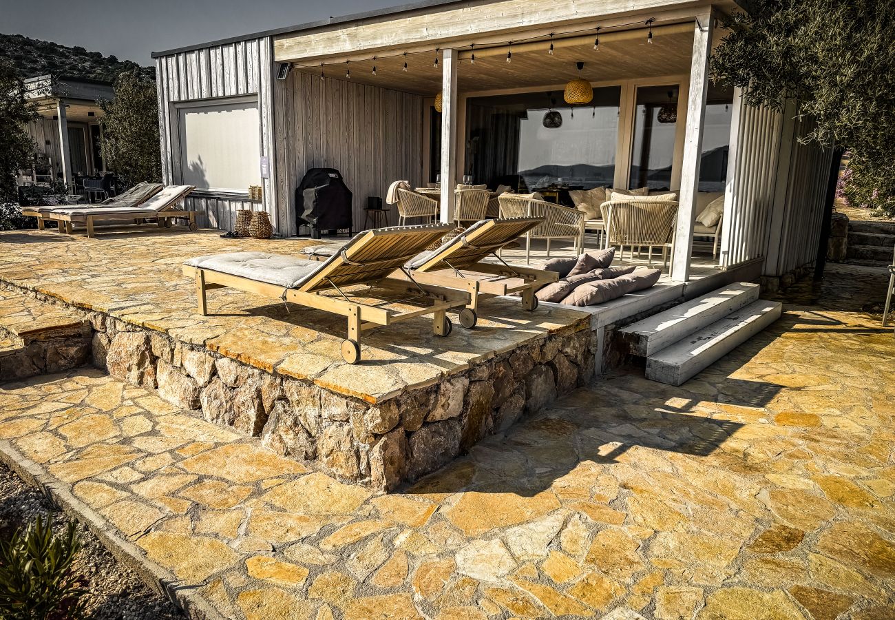 Villa in Drage - BUQEZ ECO RESORT - Villa 27 - Direkt am Strand