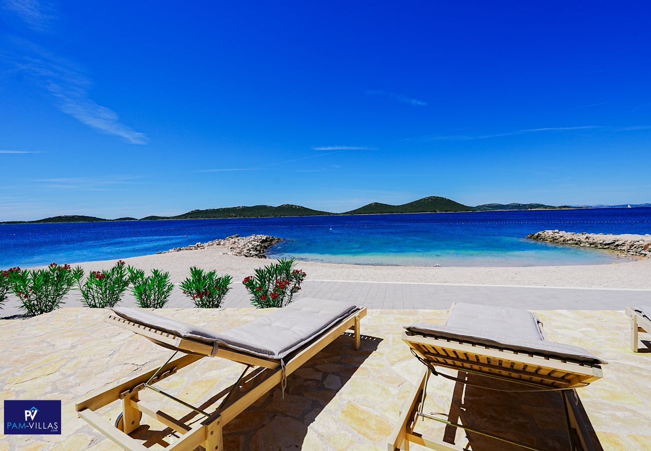 Ferienhaus in Drage - BUQEZ ECO RESORT - Villa 27 - Direkt am Strand