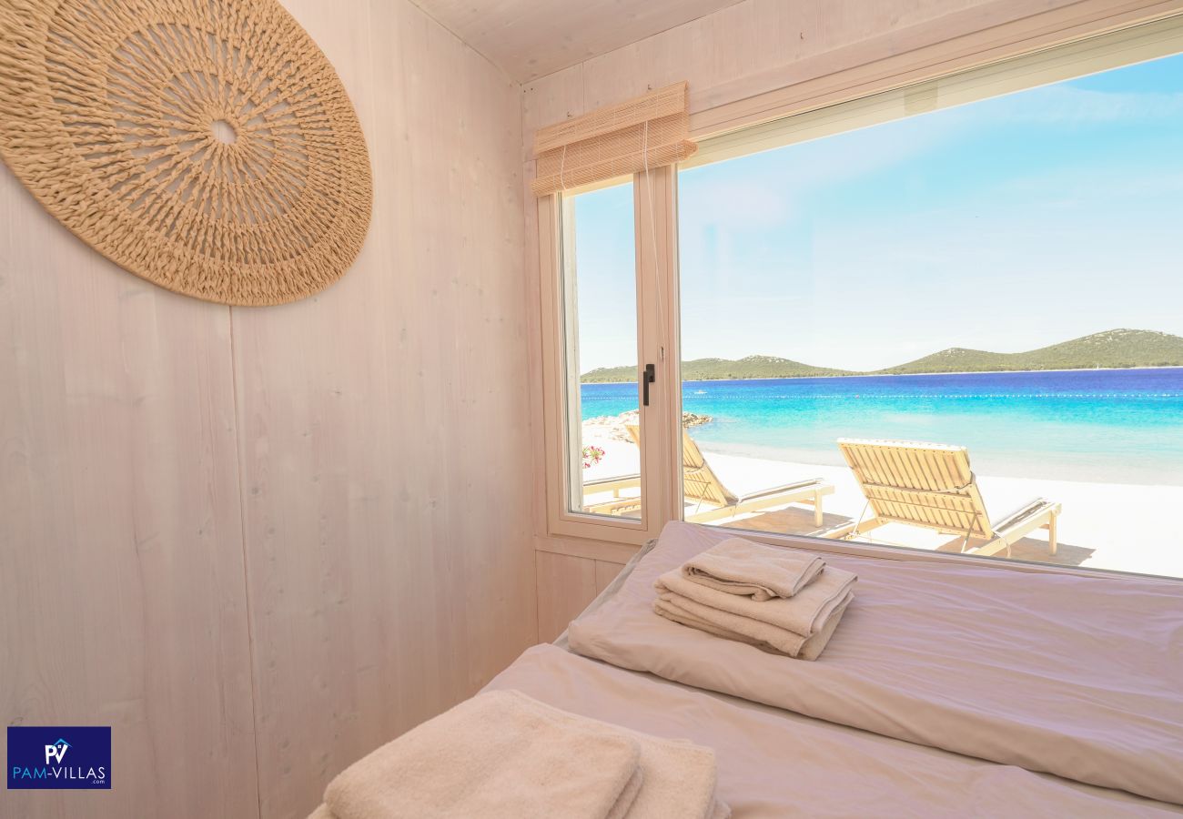 Ferienhaus in Drage - BUQEZ ECO RESORT - Villa 27 - Direkt am Strand