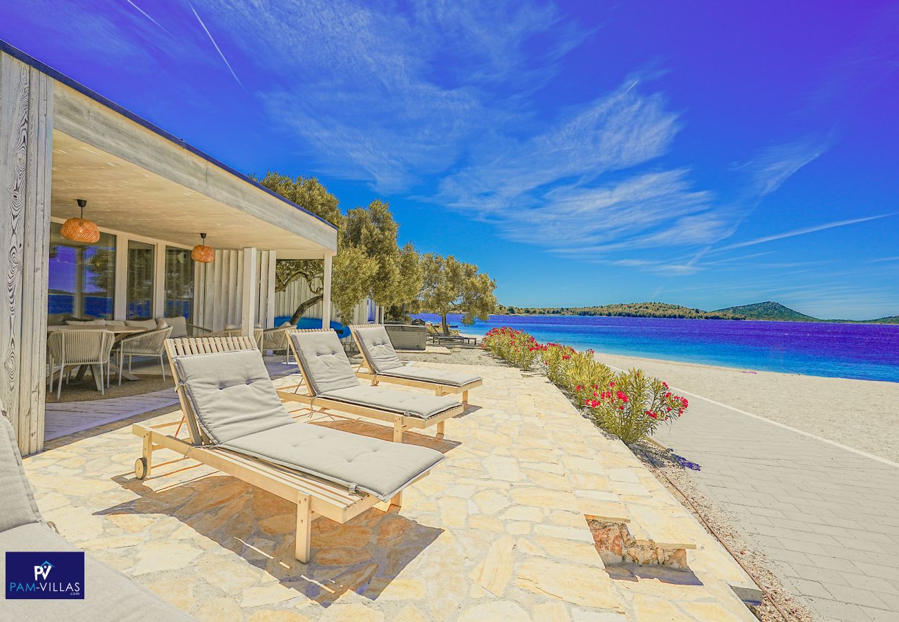 Ferienhaus in Drage - BUQEZ ECO RESORT - Villa 27 - Direkt am Strand