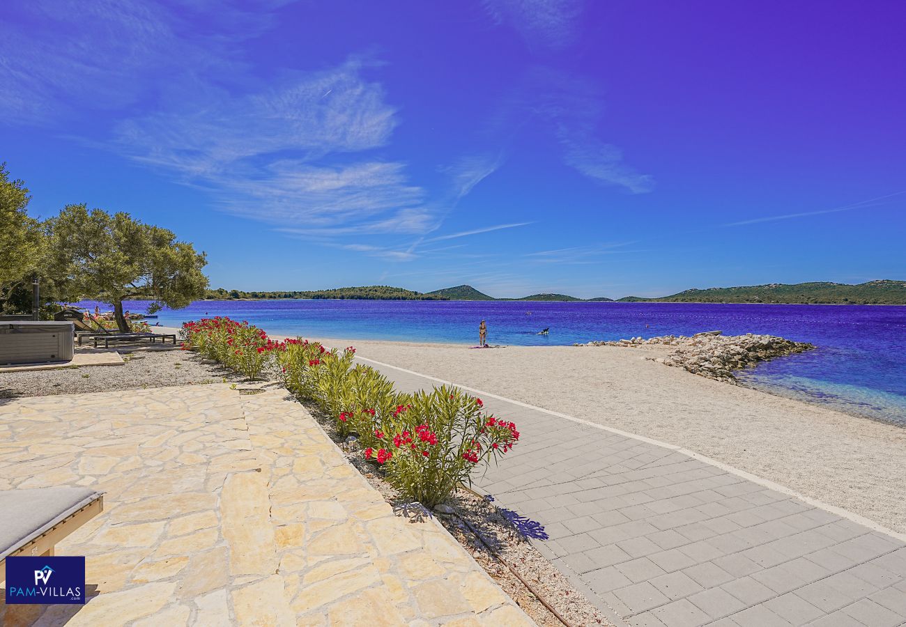 Ferienhaus in Drage - BUQEZ ECO RESORT - Villa 27 - Direkt am Strand
