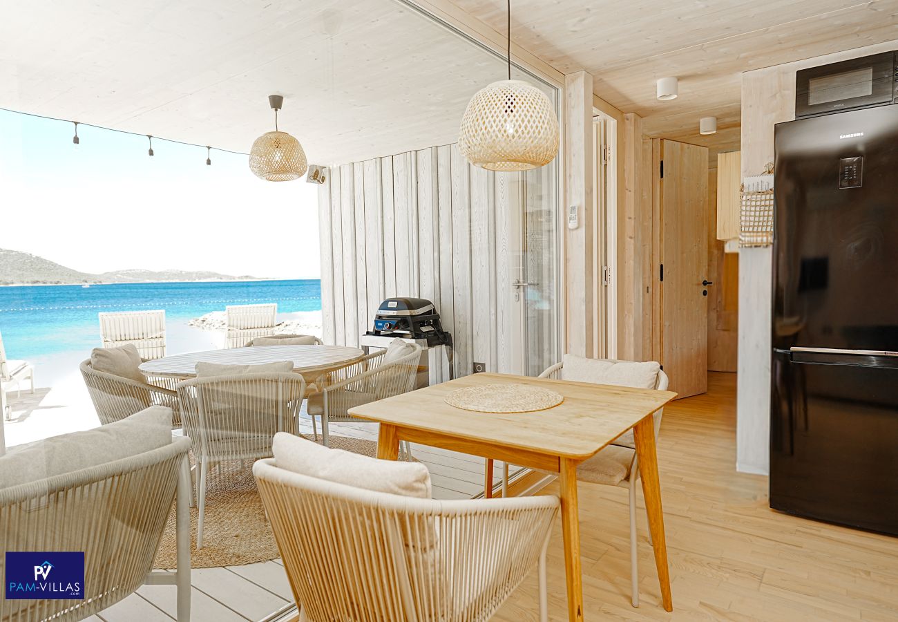 Ferienhaus in Drage - BUQEZ ECO RESORT - Villa 27 - Direkt am Strand