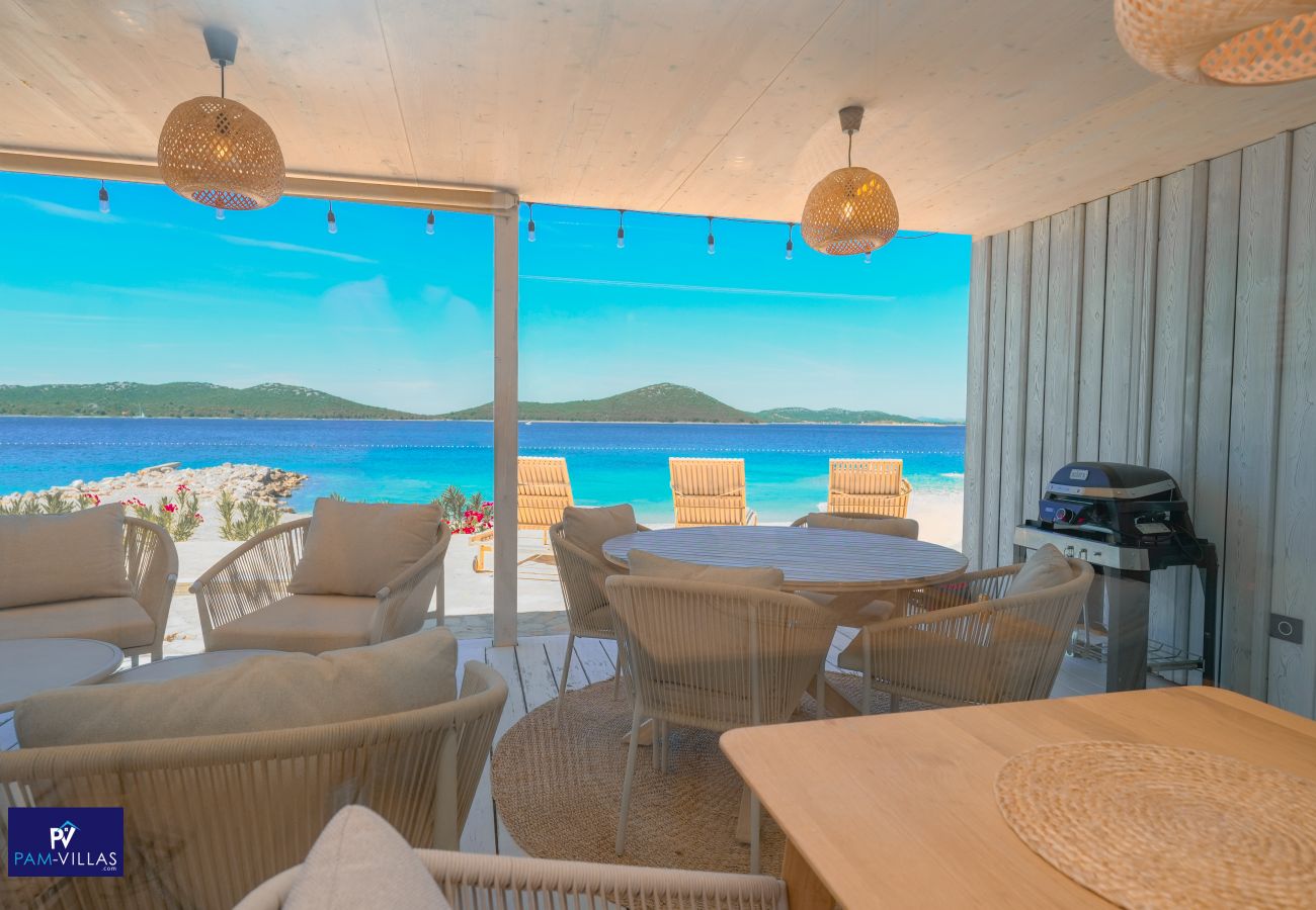 Ferienhaus in Drage - BUQEZ ECO RESORT - Villa 27 - Direkt am Strand