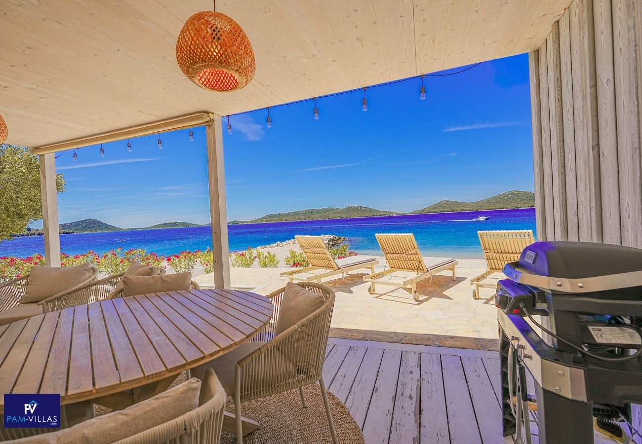 Ferienhaus in Drage - BUQEZ ECO RESORT - Villa 27 - Direkt am Strand
