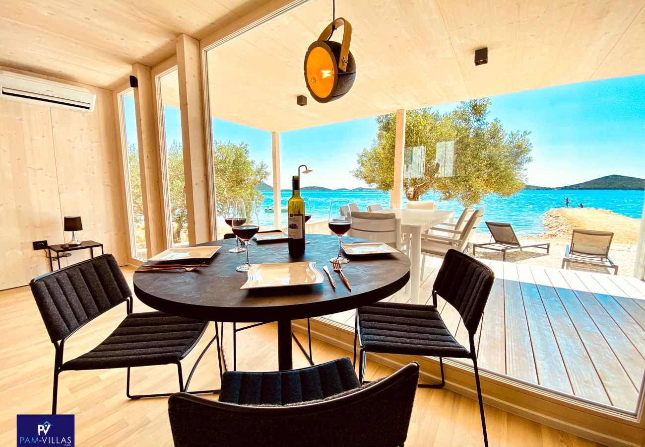 Ferienhaus in Drage - BUQEZ Beach Villas 81 & 28 – Seite an Seite
