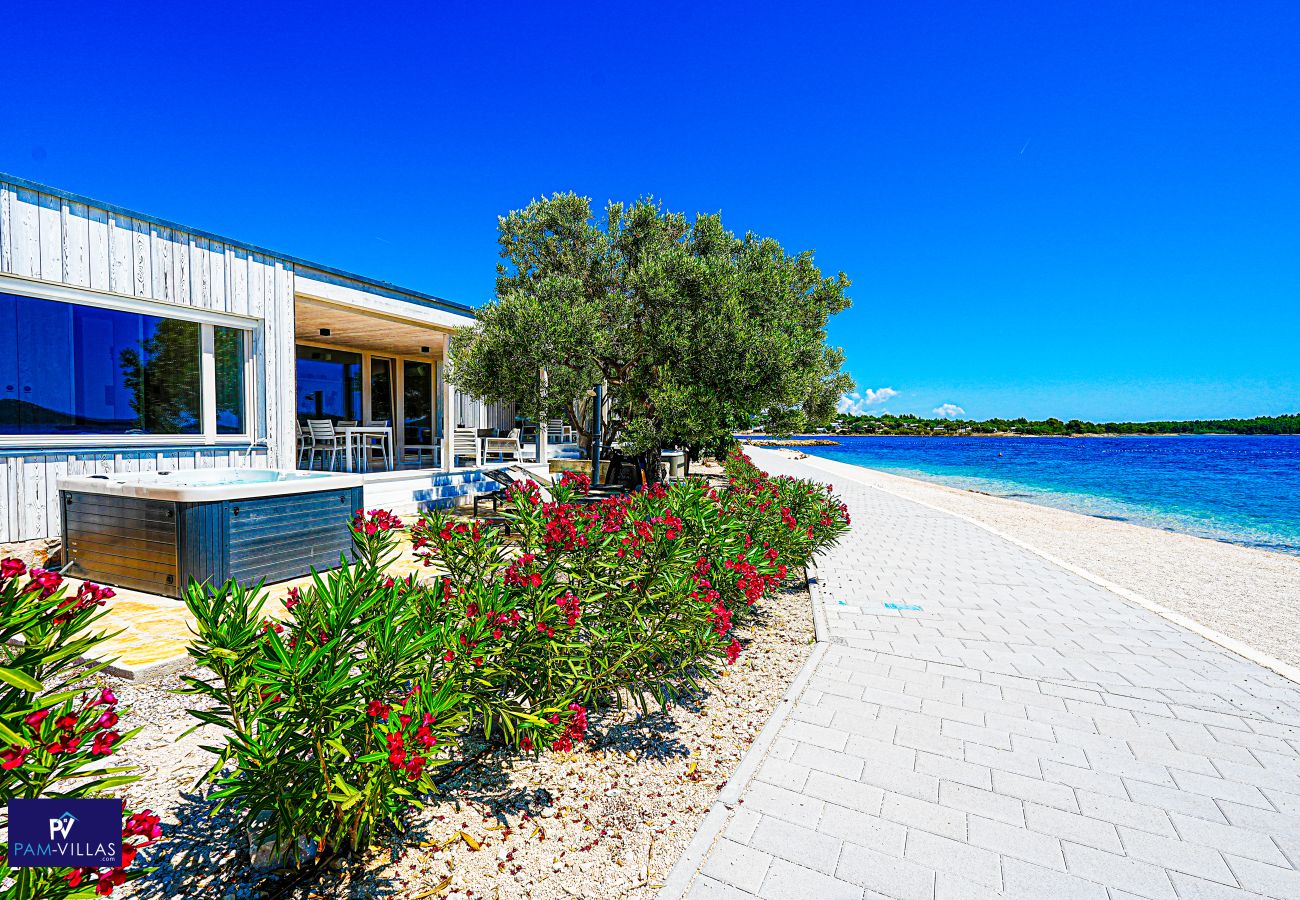Ferienhaus in Drage - BUQEZ Beach Villas 81 & 28 – Seite an Seite